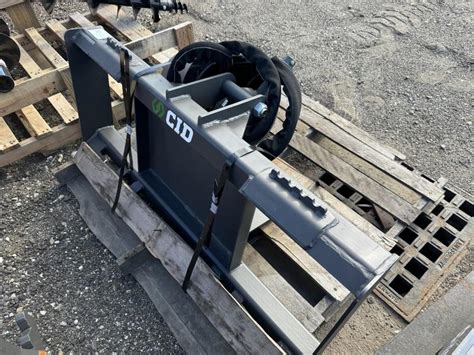 skid steer with new cid extreme auger|cid x extreme auger attachment.